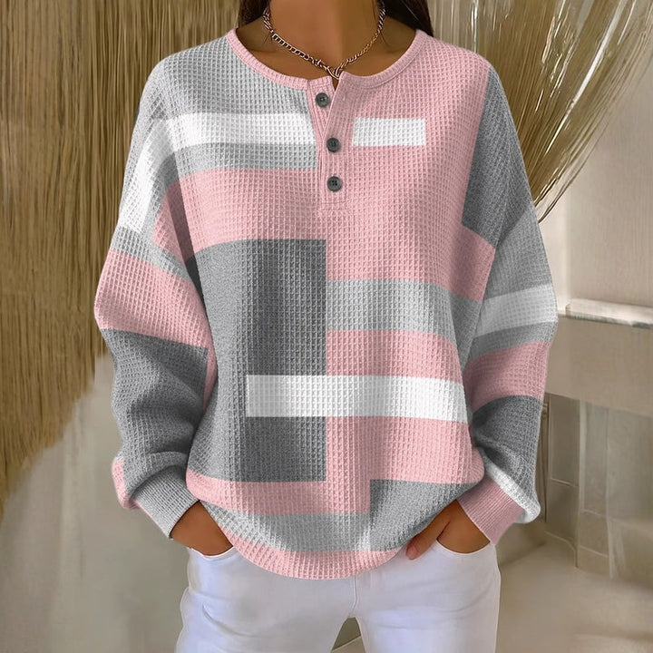 Aimee - Camisola com detalhe de botão em cores contrastantes