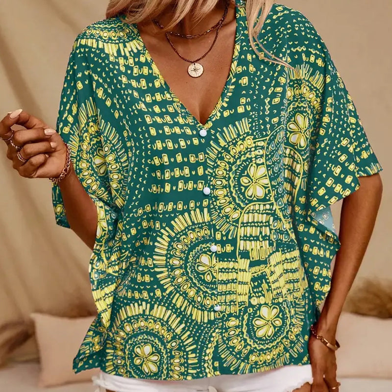 Noellise - Blusa artística com mangas morcego