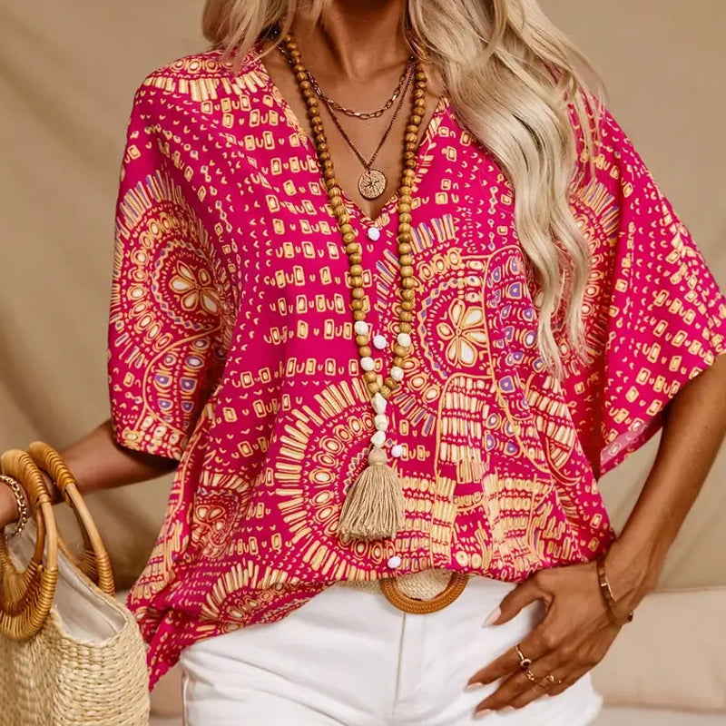 Noellise - Blusa artística com mangas morcego