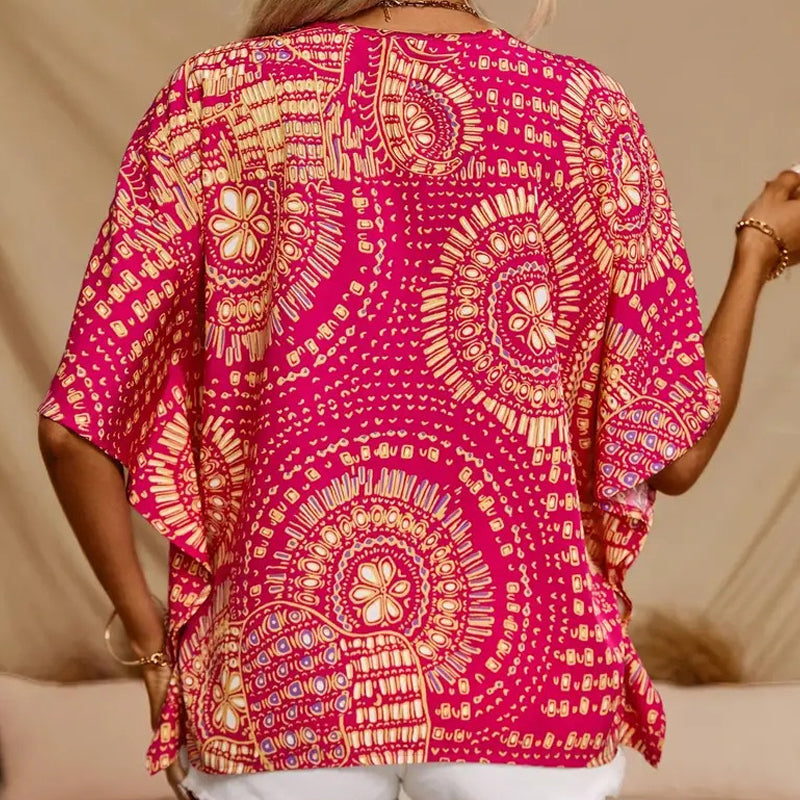 Noellise - Blusa artística com mangas morcego